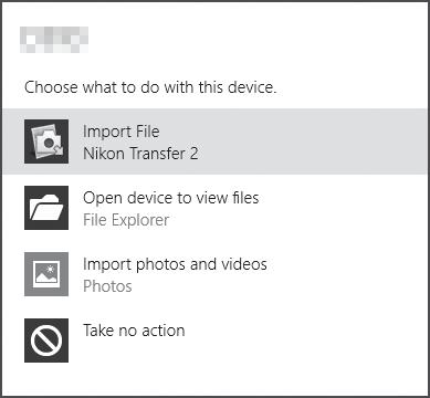 1 În Import pictures and videos (Import imagini şi fişiere video), faceţi clic pe Change program (Modificare program).