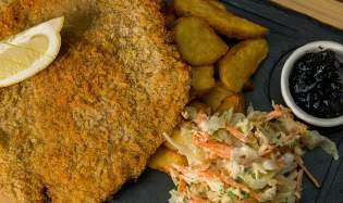 varz\, morcov) *Wiener Schnitzel with wedges, Coleslaw salad and blueberry jam (veal knuckle, egg, flour, Panko bread crumbs, butter, celery, sour cream,