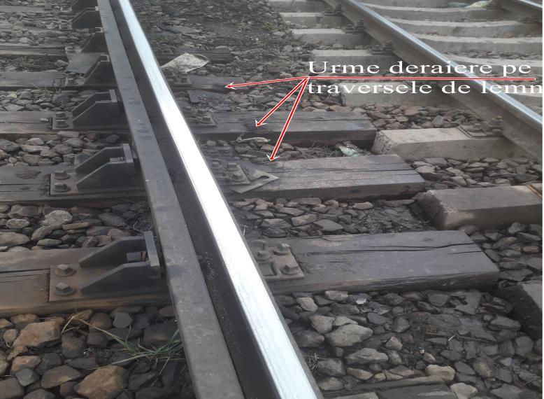șurub vertical de prindere a șinei de placa metalică, la 300 cm de punctul 0 ; la 580 cm de punctul 0, pe aceeași parte (dreapta în sensul de mers al trenului), s-a constatat o a doua urmă de cădere